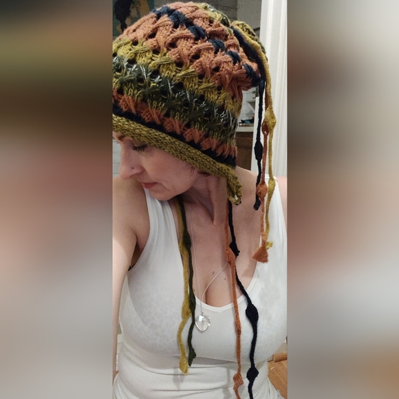 hand-crocheted multicolor beanie with ear flaps and tassel details. - Picture 6 of 6